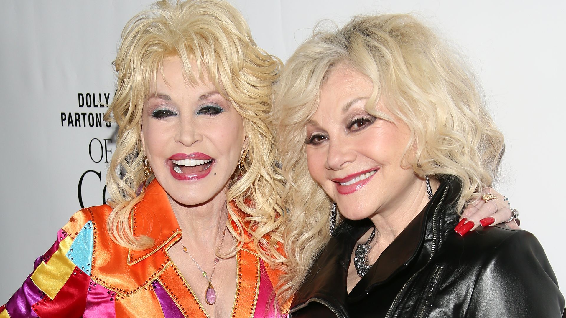 Dolly Parton and Stella Parton attend the premiere of Warner Bros. Television's "Dolly Parton's Coat Of Many Colors"