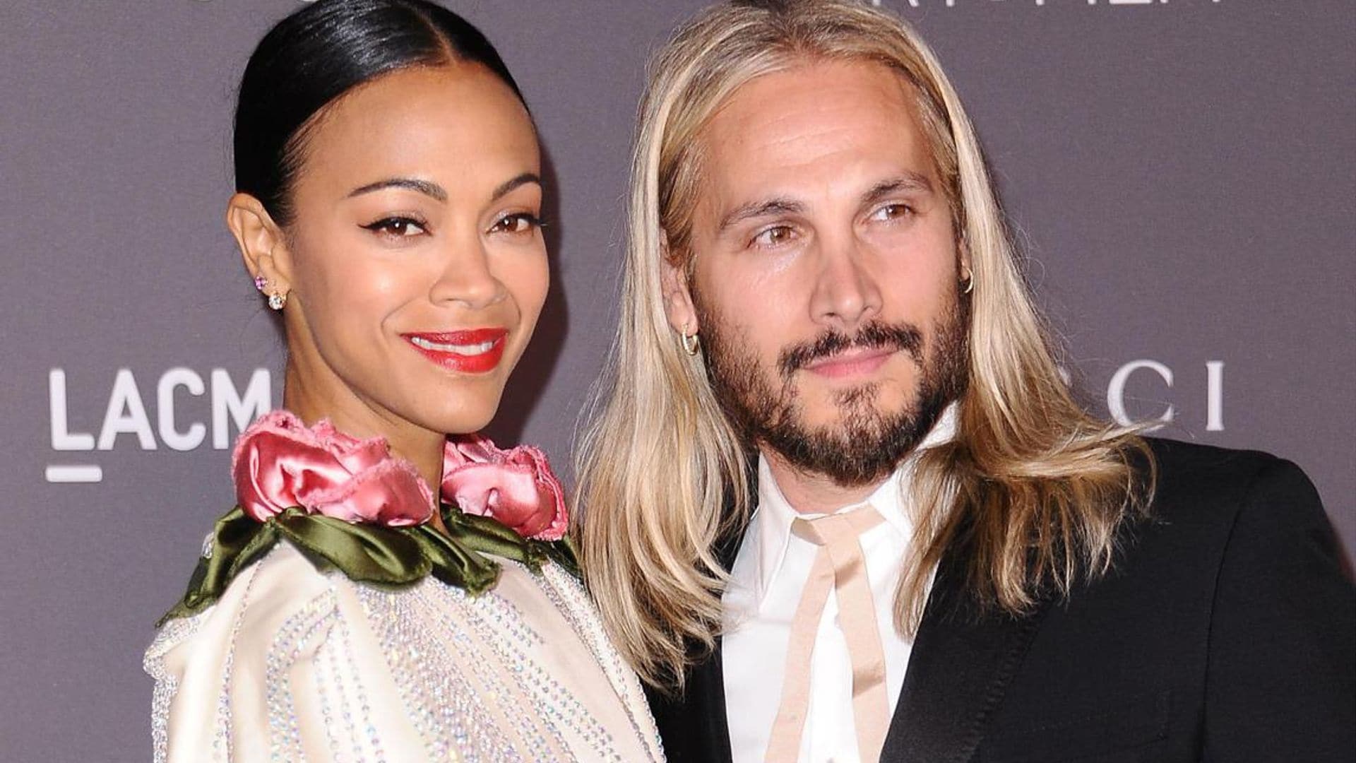 Zoe Saldaña and husband Marco Perego packed on the PDA while surfing in Malibu
