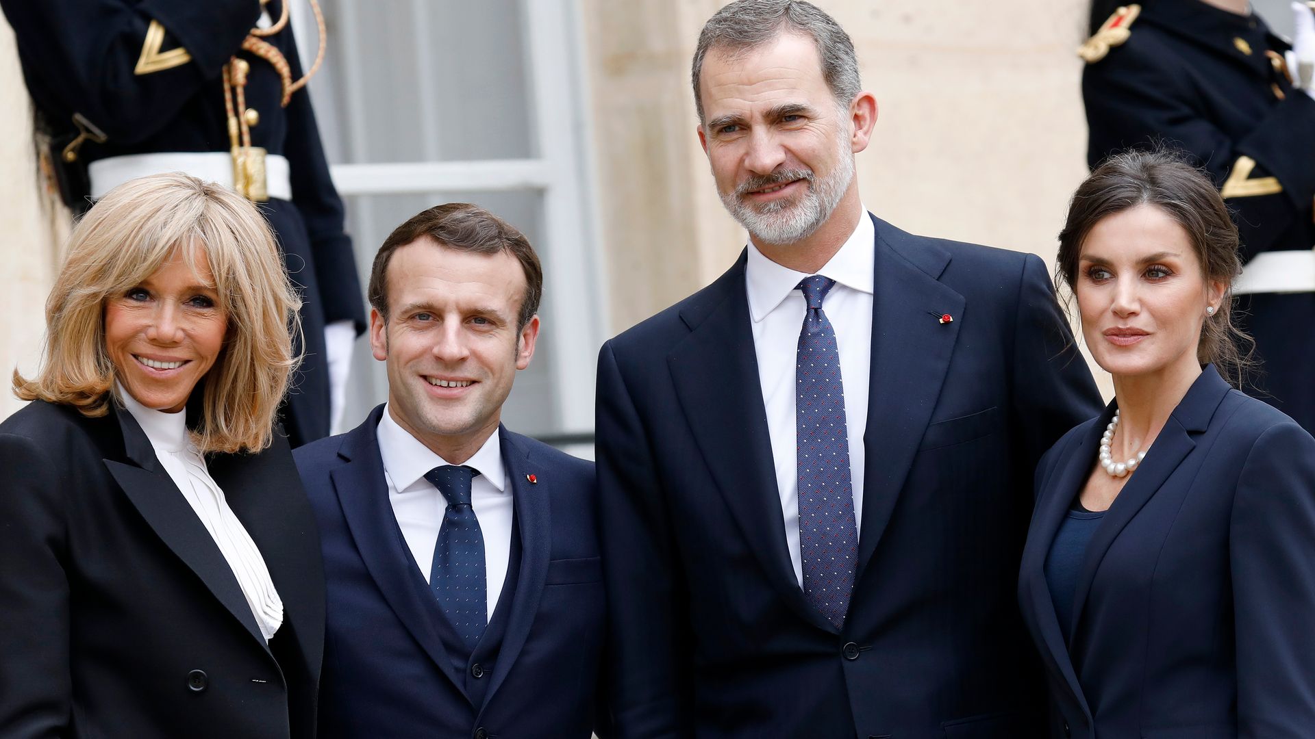 Emmanuel Macron and his wife Brigitte Macron welcoming King Felipe and Queen Letizia of Spain in 2020