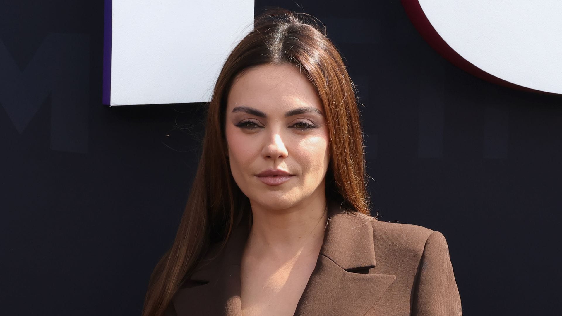 Mila Kunis attends Netflix Tudum 2025: The Live Event at The Kia Forum on May 31, 2025 in Inglewood, California. 