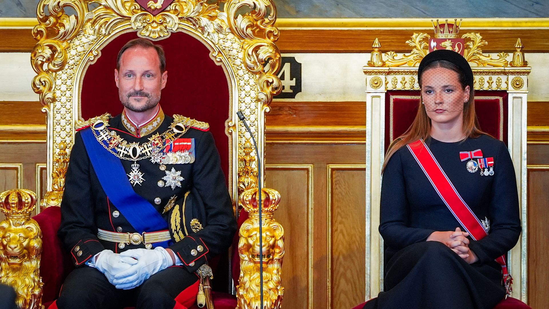Crown Princess Ingrid Alexandra of Norway sits next to her father King Haakon VIII during an oath-taking ceremony for the new king