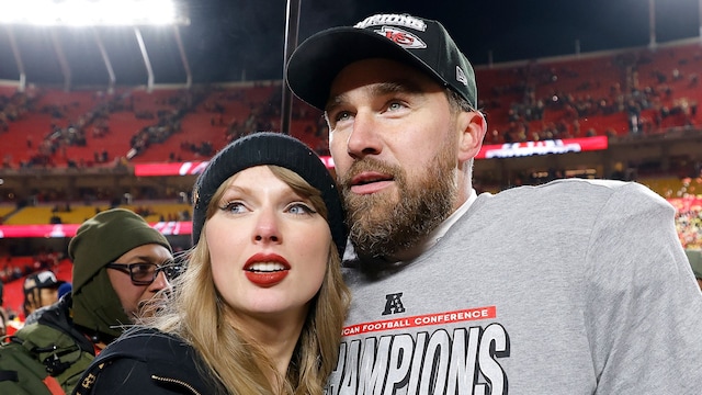 Taylor Swift and Travis Kelce celebrating the Kansas City Chiefs win