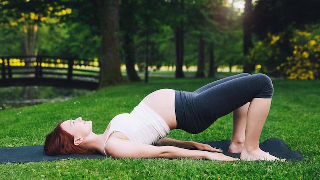 Pregnant woman bridge pose