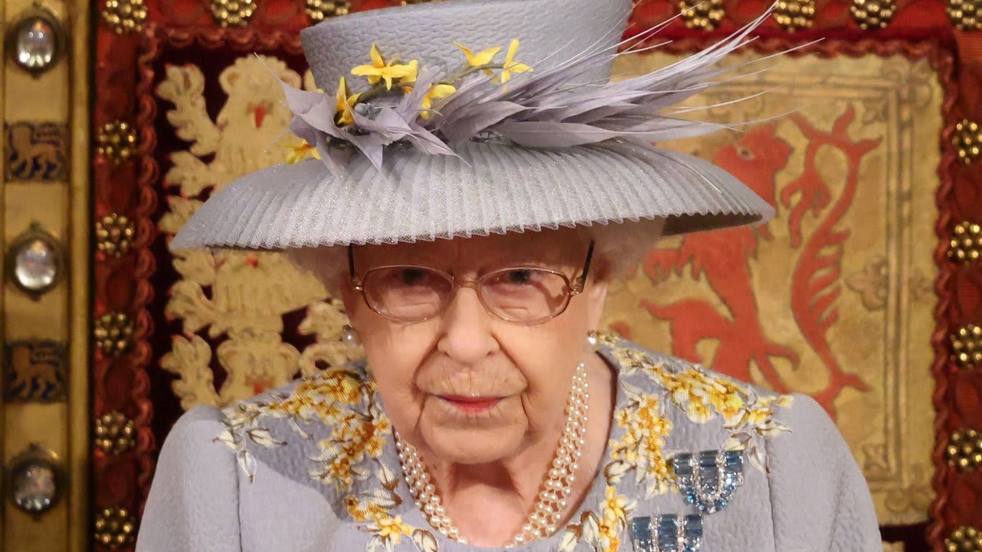 Queen Elizabeth pays tribute to Prince Philip as she returns to London