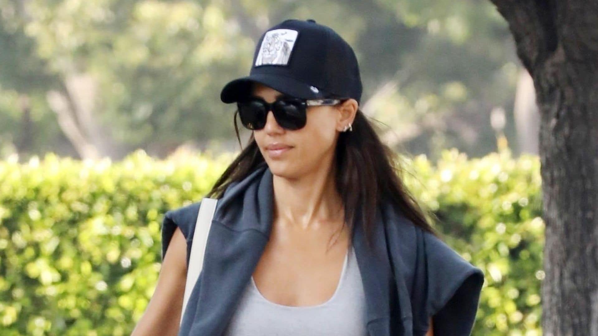 Jessica Alba shows off her toned abs after Cash Warren is spotted with another mystery woman