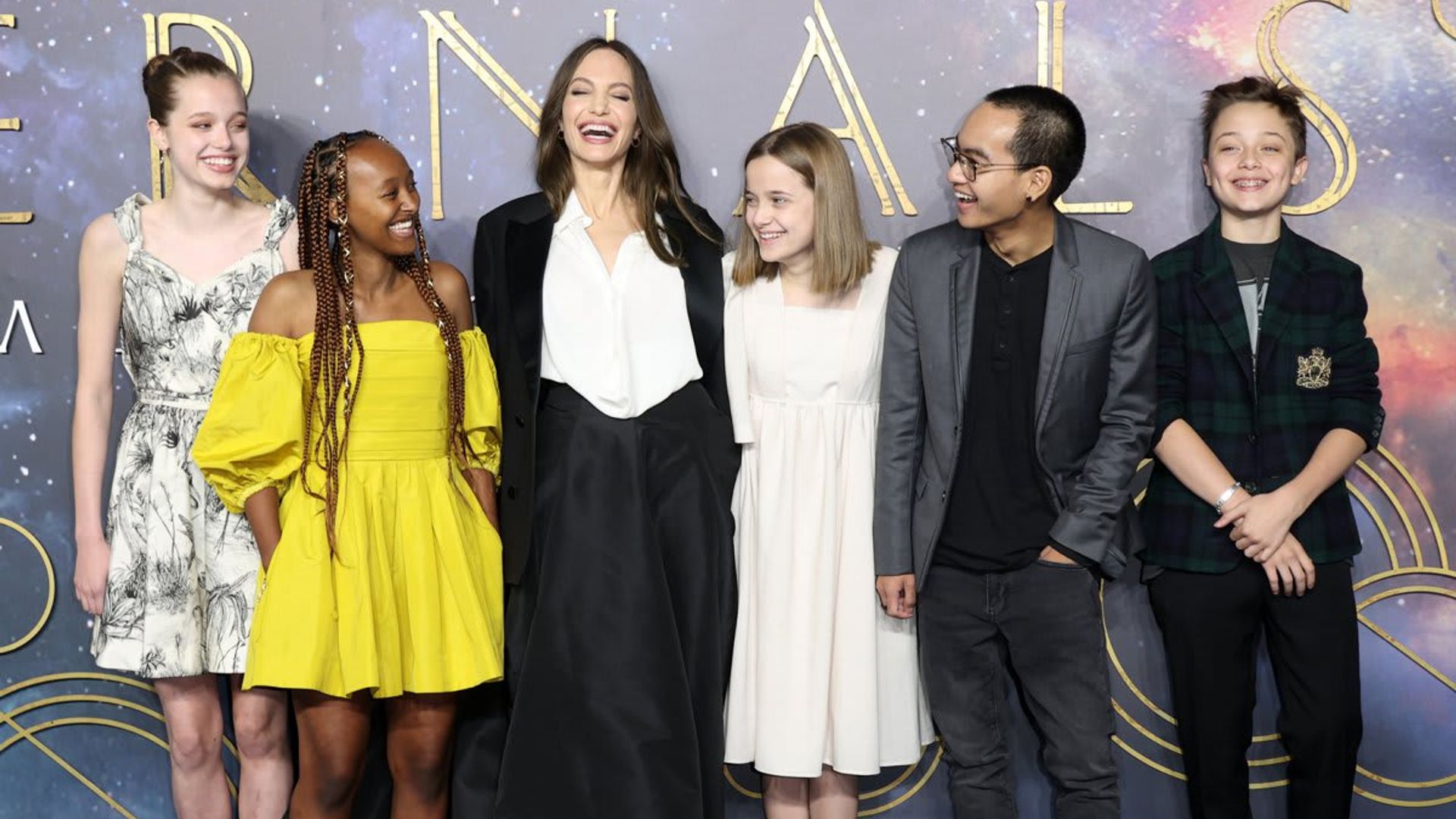 Angelina Jolie and her kids are all smiles as they hit the red carpet together in London