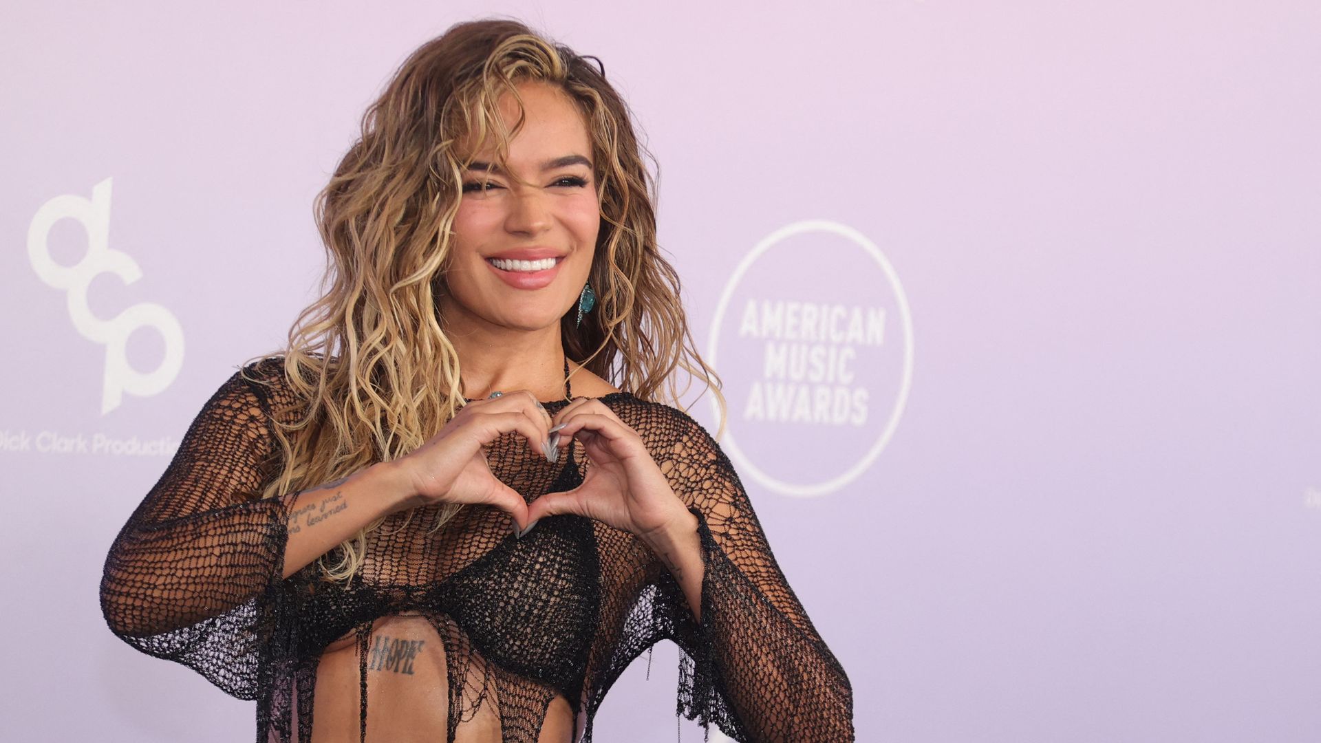 Colombian singer Karol G attends the American Music Awards at the MGM Grand Garden Arena in Las Vegas, Nevada on May 25, 2026. (Photo by Ian Maule / AFP via Getty Images) 