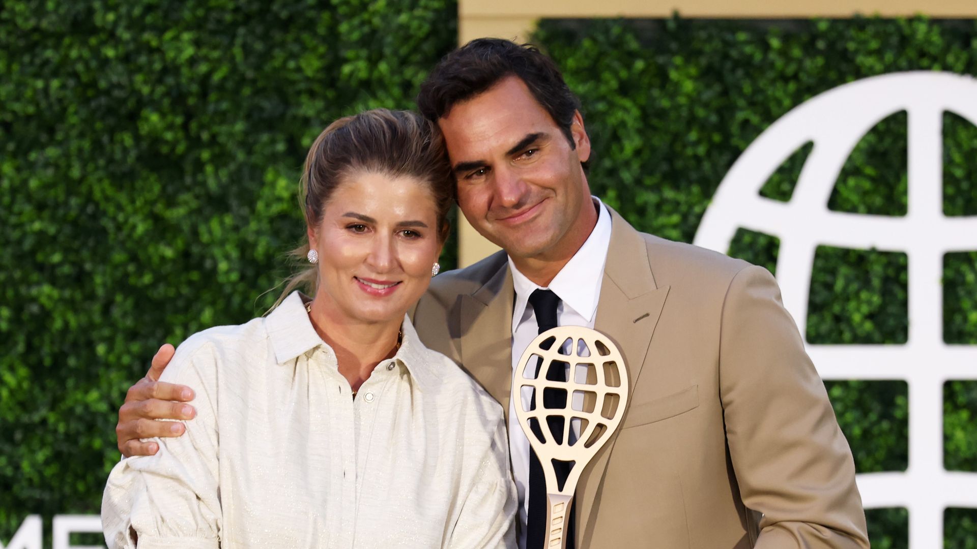 Roger Federer holds back tears while thanking his wife at Tennis Hall of Fame induction