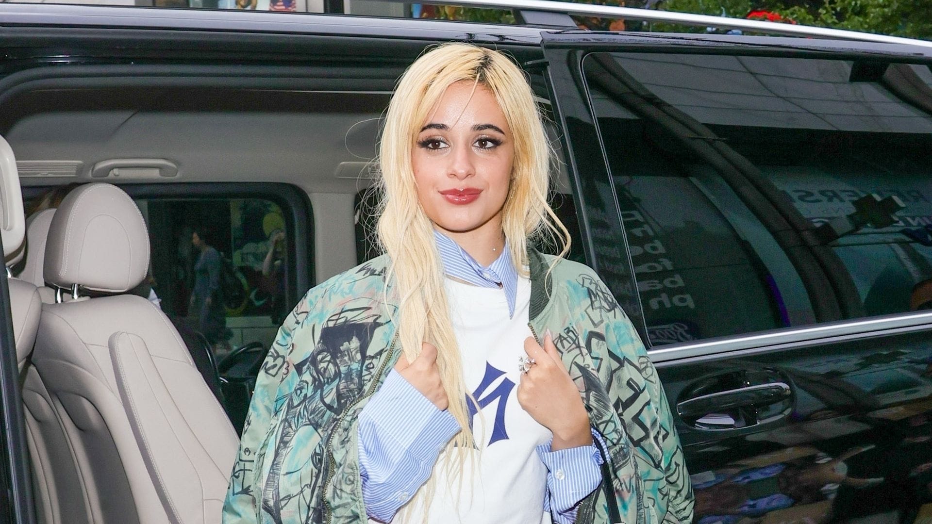 Camila Cabello is all smiles in mini shirtdress in London [PHOTOS]