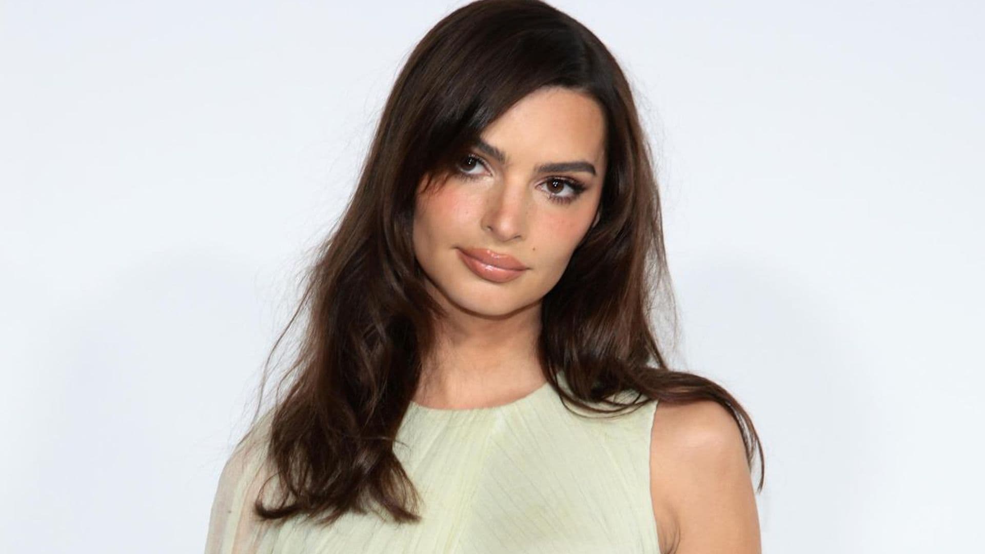 Emily Ratajkowski gives the Christmas sweater a sexy twist