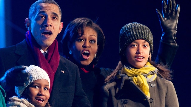 Barack Obama, joined by his family including First Lady Michelle Obama, daughters Sasha and Malia