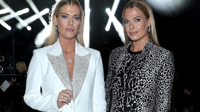 Amelia Spencer and Eliza Spencer attend the Michael Kors Collection