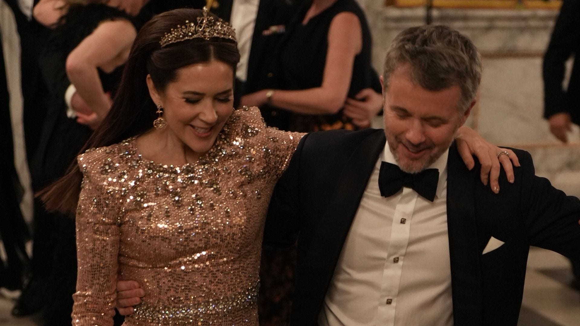Queen Mary of Denmark is the dancing queen at party at the palace: Watch