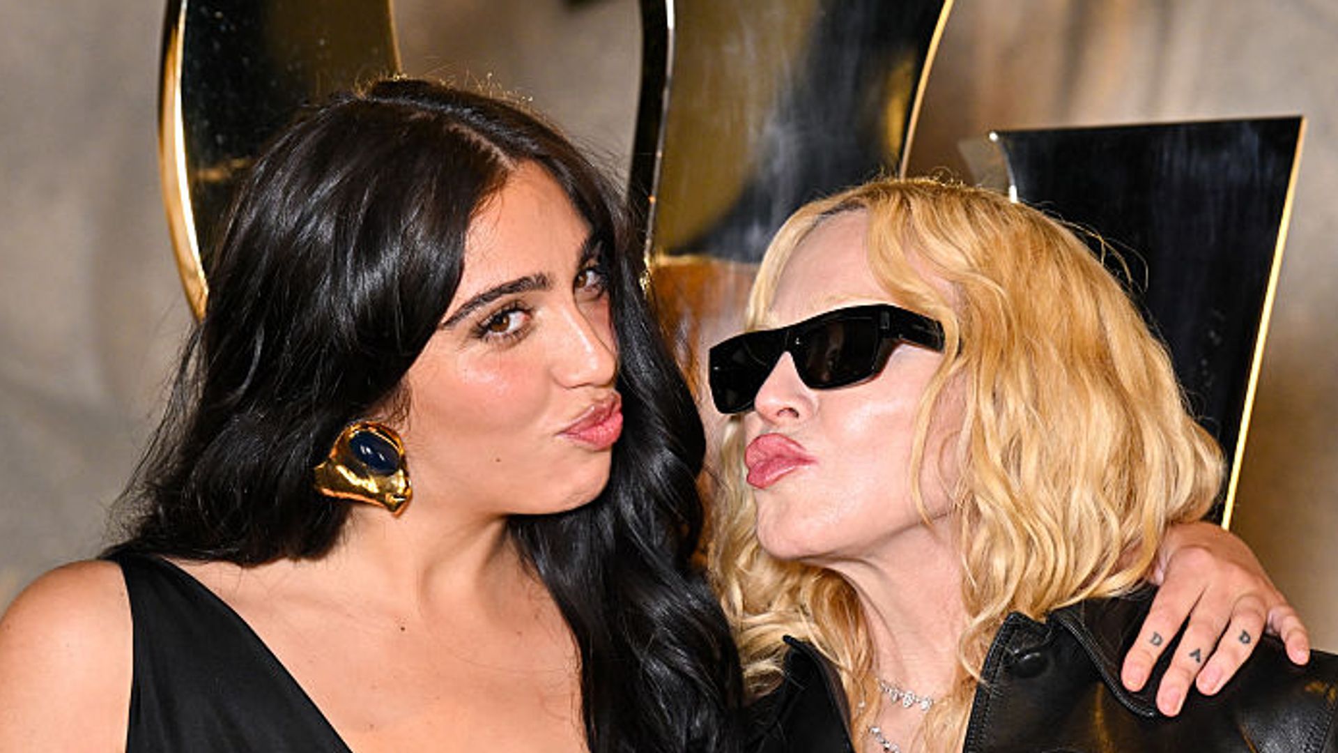 PARIS, FRANCE - SEPTEMBER 29: (EDITORIAL USE ONLY - For Non-Editorial use please seek approval from Fashion House) Lourdes Leon and Madonna attend the Saint Laurent Womenswear Spring/Summer 2026 show as part of Paris Fashion Week on September 29, 2025 in Paris, France. (Photo by Stephane Cardinale - Corbis/Corbis via Getty Images) 