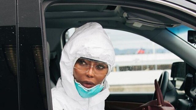 Naomi Campbell traveling