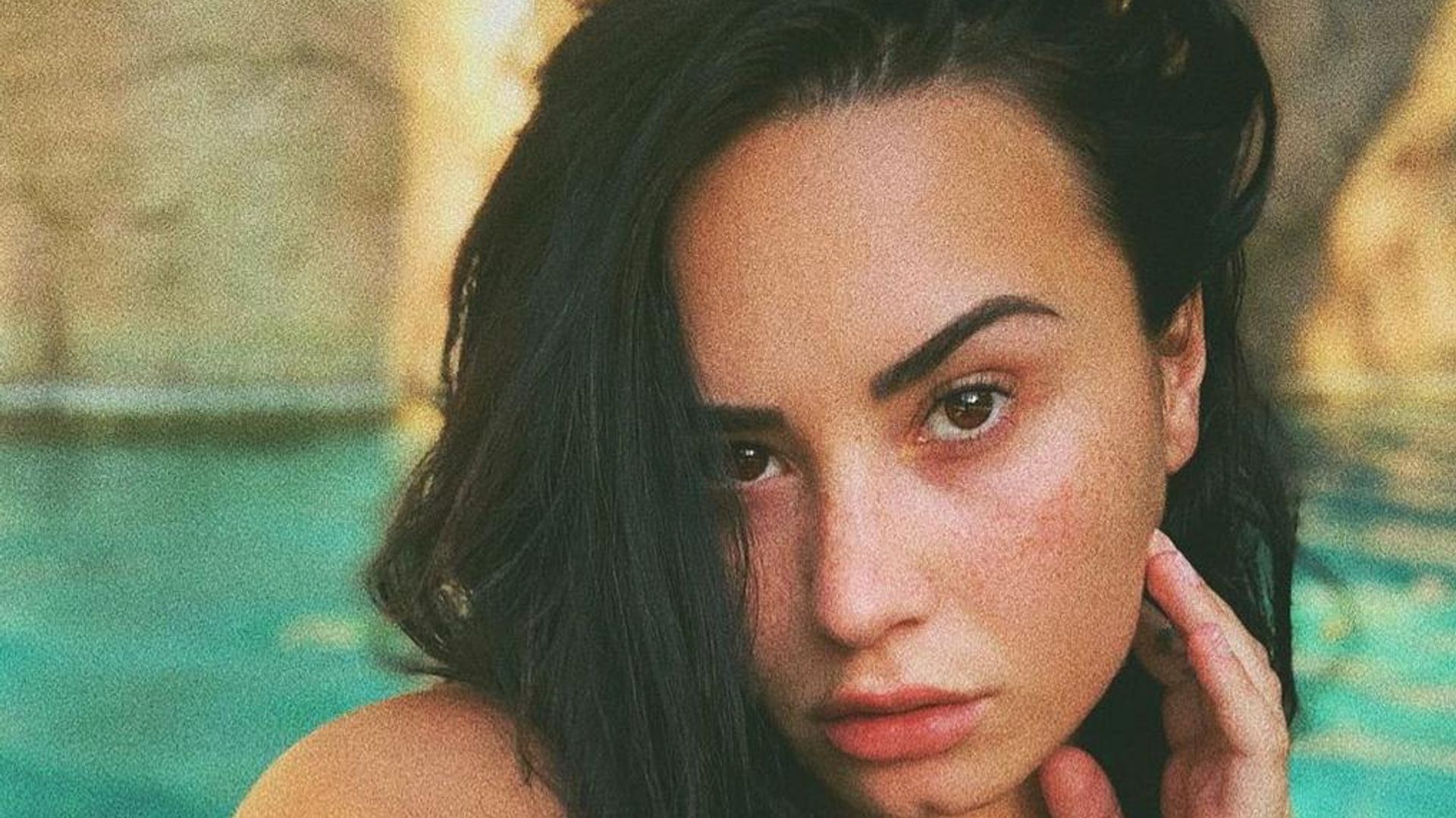 Demi Lovato goes makeup-free in sultry swimsuit photos – and her boyfriend approves
