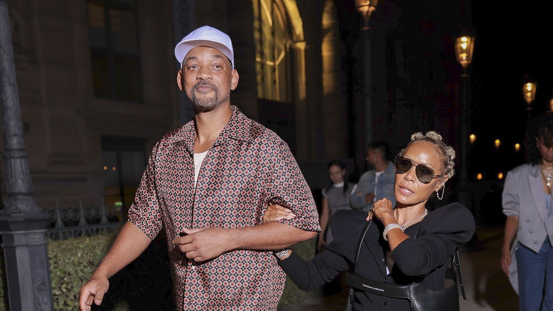 Will and Jada were spotted looking stylish together, holding out to each other's arms