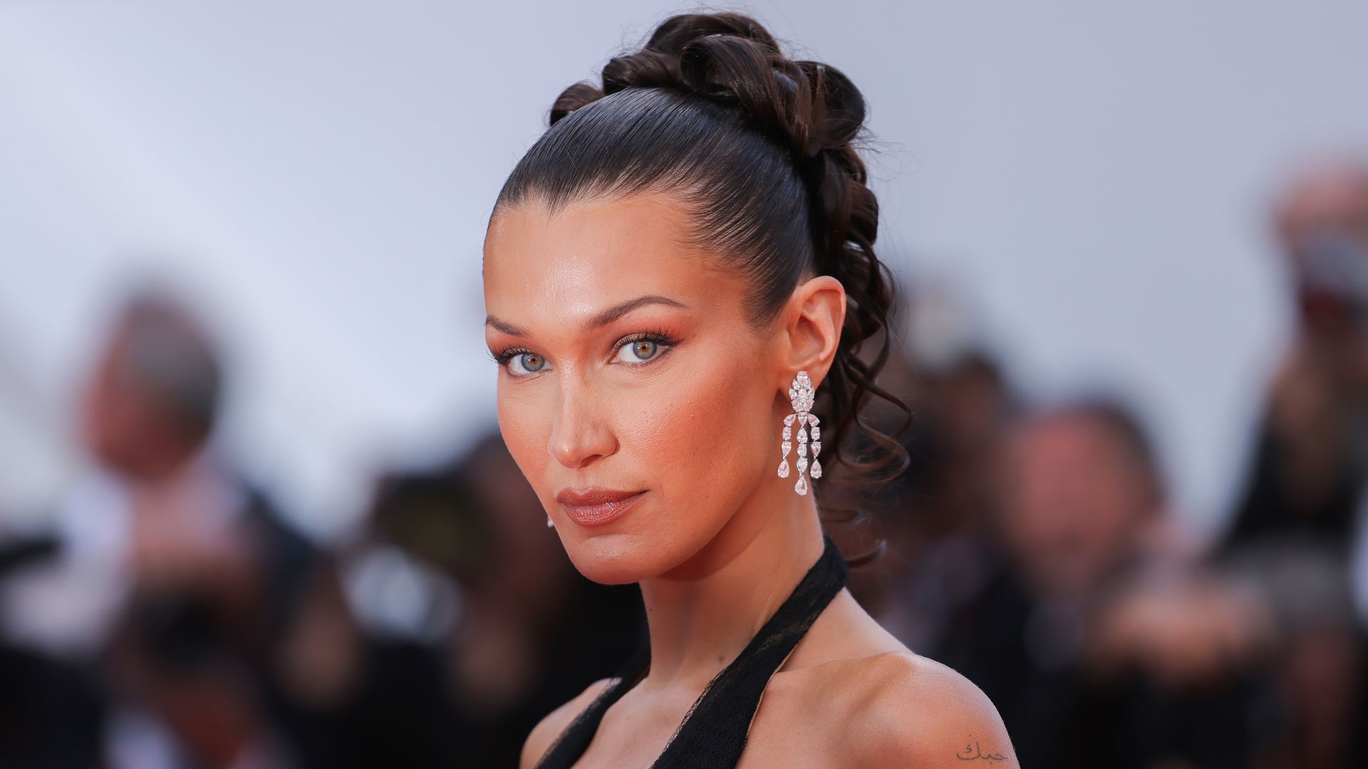 Bella Hadid stuns in red leather as she continues her acting journey
