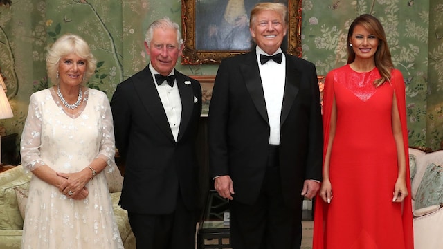 US President Donald Trump (2R), US First Lady Melania Trump (R), Britain's Prince Charles, Prince of Wales (2L), and his wife Britain's Camilla, Duchess of Cornwall, pose for a photograph ahead of a dinner at Winfield House, the residence of the US Ambassador, where US President Trump is staying whilst in London, on June 4, 2019, on the second day of the US President's three-day State Visit to the UK. US President Donald Trump turns from pomp and ceremony to politics and business on Tuesday as he meets Prime Minister Theresa May on the second day of a state visit expected to be accompanied by mass protests. (Photo by Chris Jackson / POOL / AFP) (Photo by CHRIS JACKSON/POOL/AFP via Getty Images)