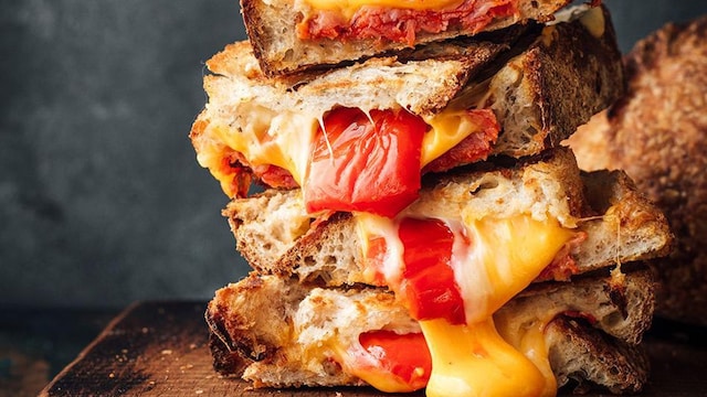 Toasted sandwiches with chorizo, cheese and grilled peppers