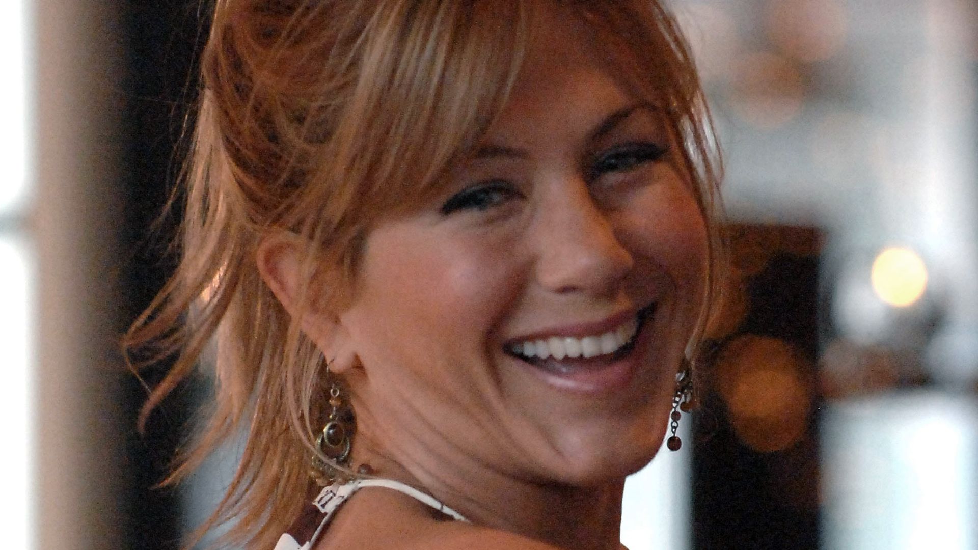 Jennifer Aniston on a relatable hair dilemma: Bangs or no bangs?