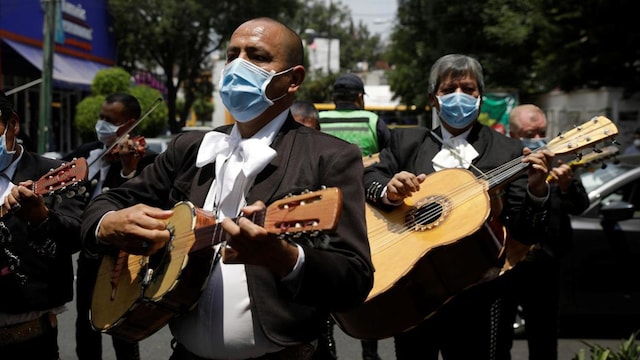 A mariachi band delivers a serenade for the medical staff of the National Institute of Respiratory Diseases