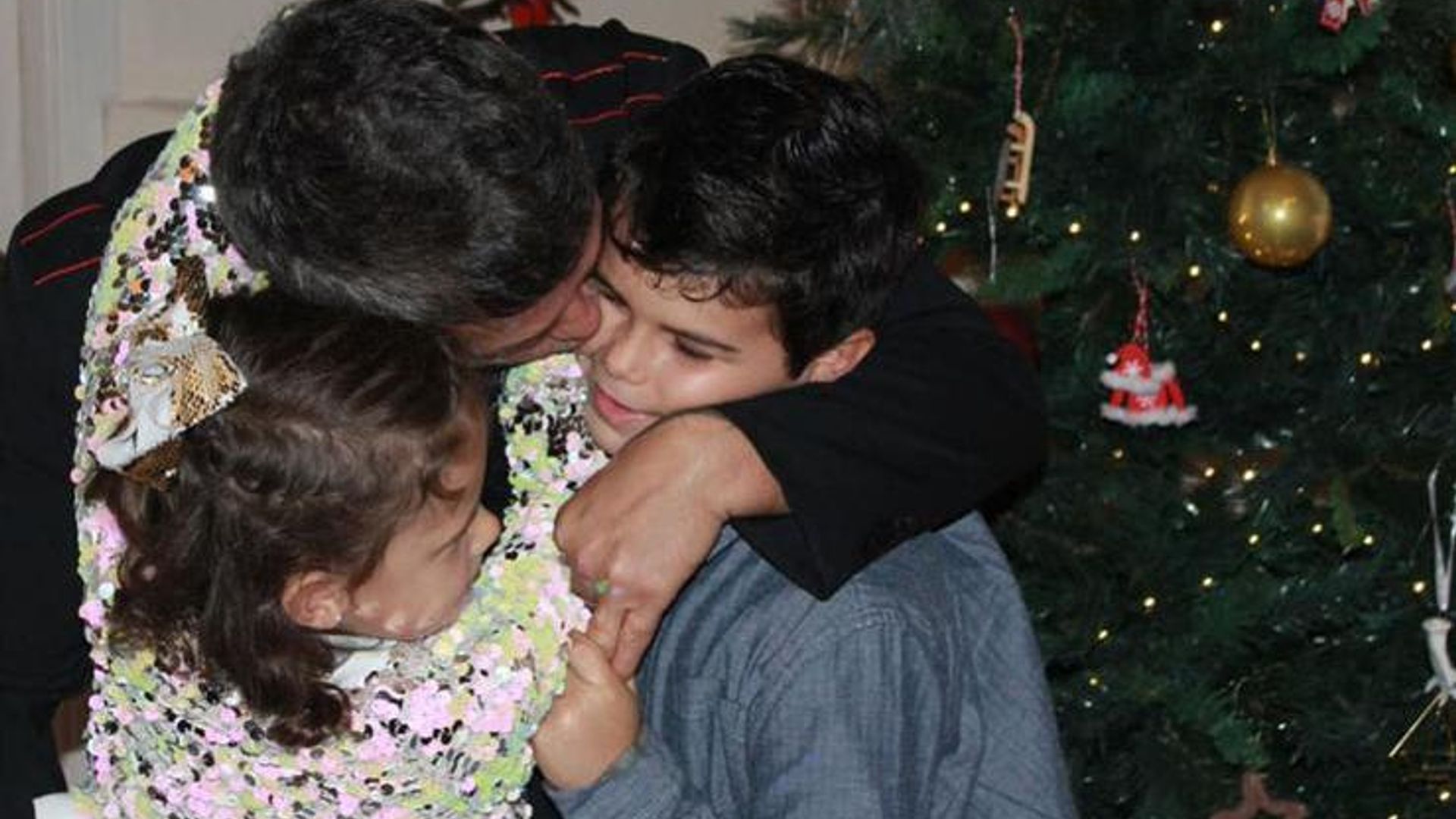 Alejandro Sanz kisses son Dylan and daughter Alma in rare photo featuring his children