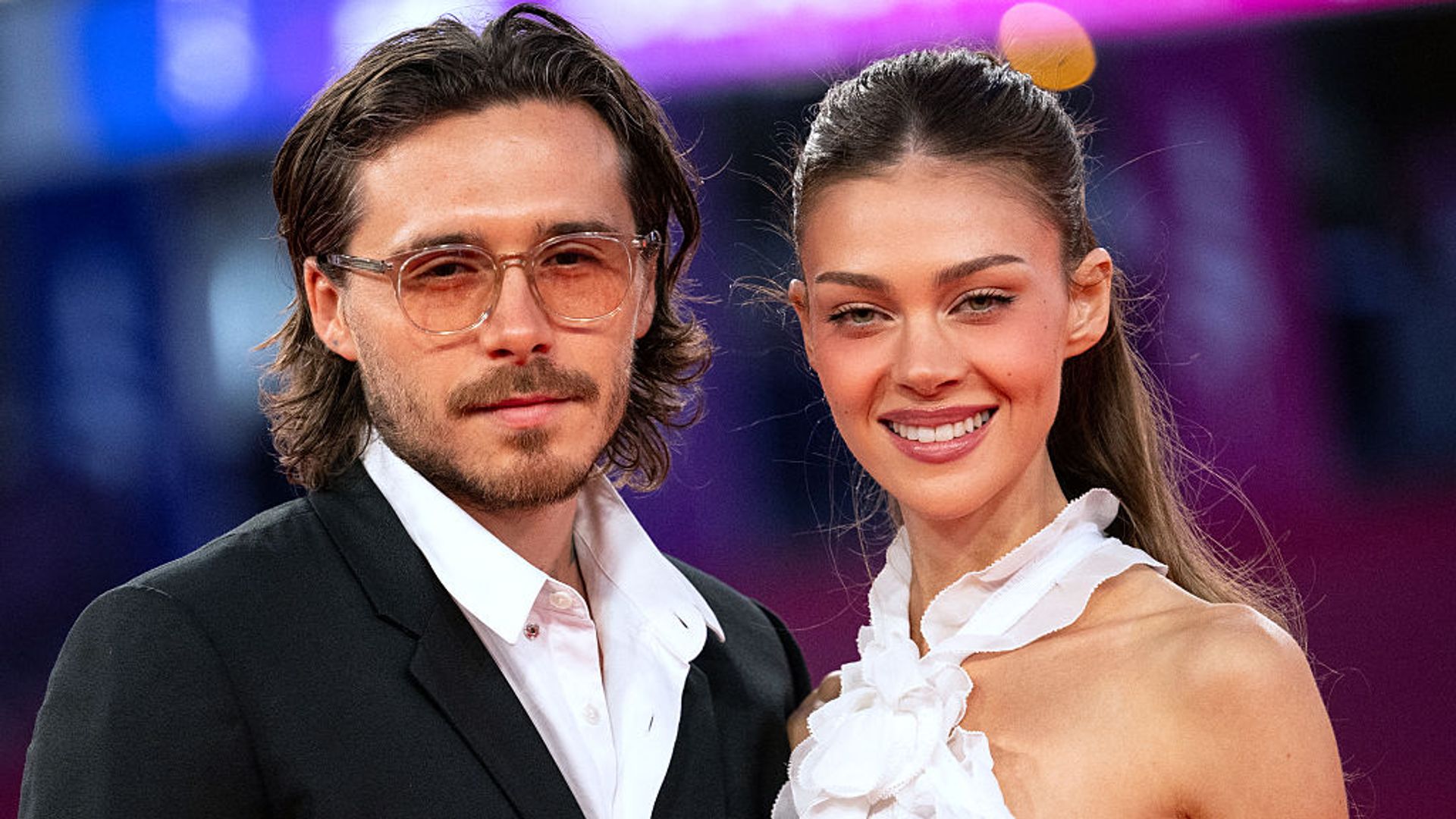 British personality Brooklyn Beckham (L) and US model Nicola Peltz (R) pose on the red carpet during the 52nd edition of the Deauville American film festival, in Deauville, northwestern France on September 8, 2026. (Photo by Guillaume SALIGOT / AFP via Getty Images) 