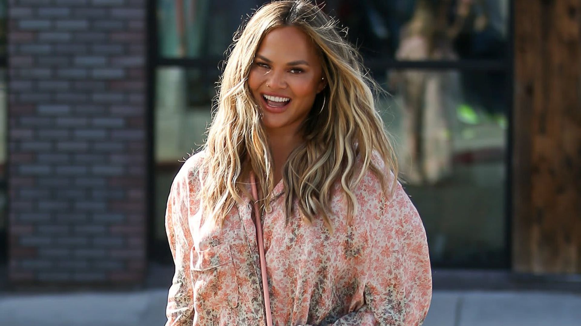 New look: Chrissy Teigen unveils eyebrow transplant results