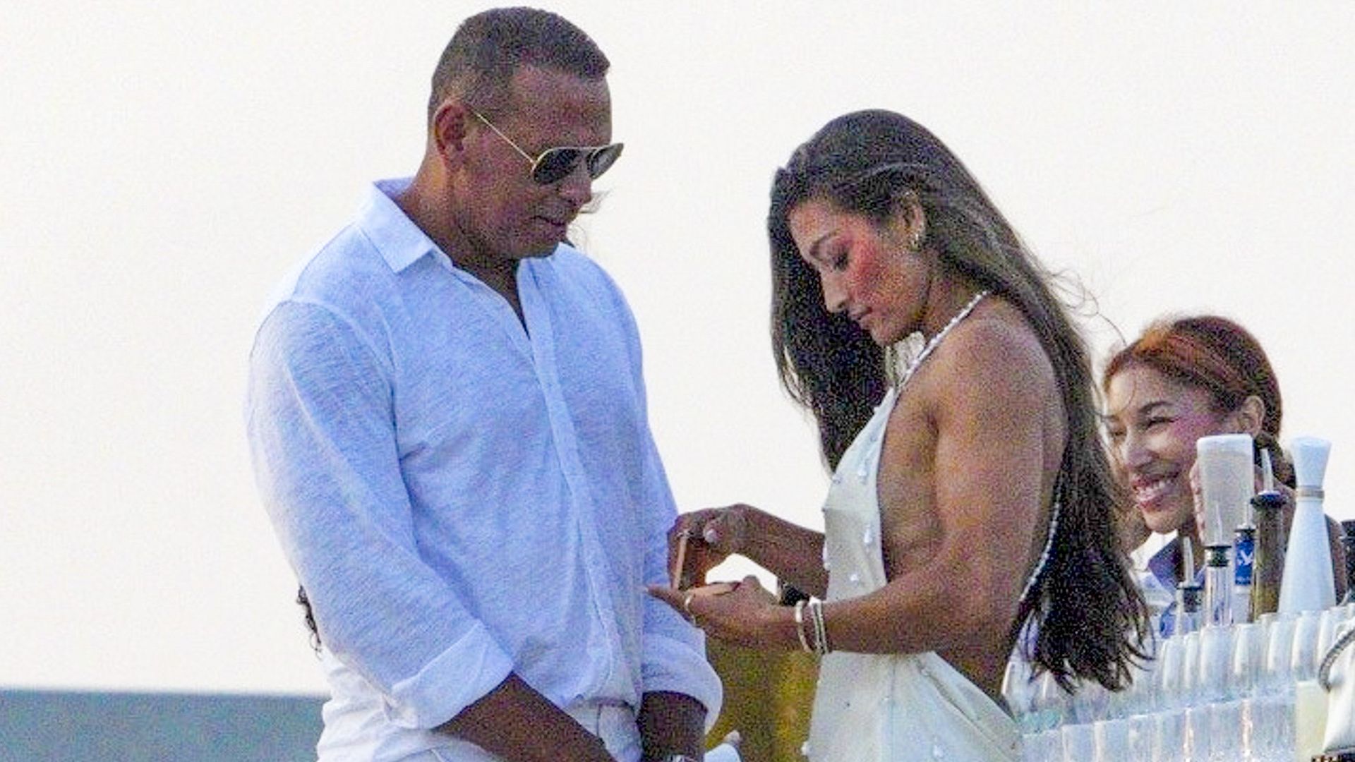 Alex Rodriguez spotted kissing mystery brunette at Michael Rubin's White Party weeks after split from Jaclyn Cordeiro