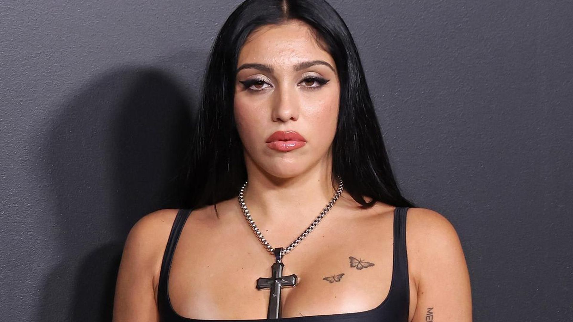 Lourdes Leon shows off bold black dress while on vacation