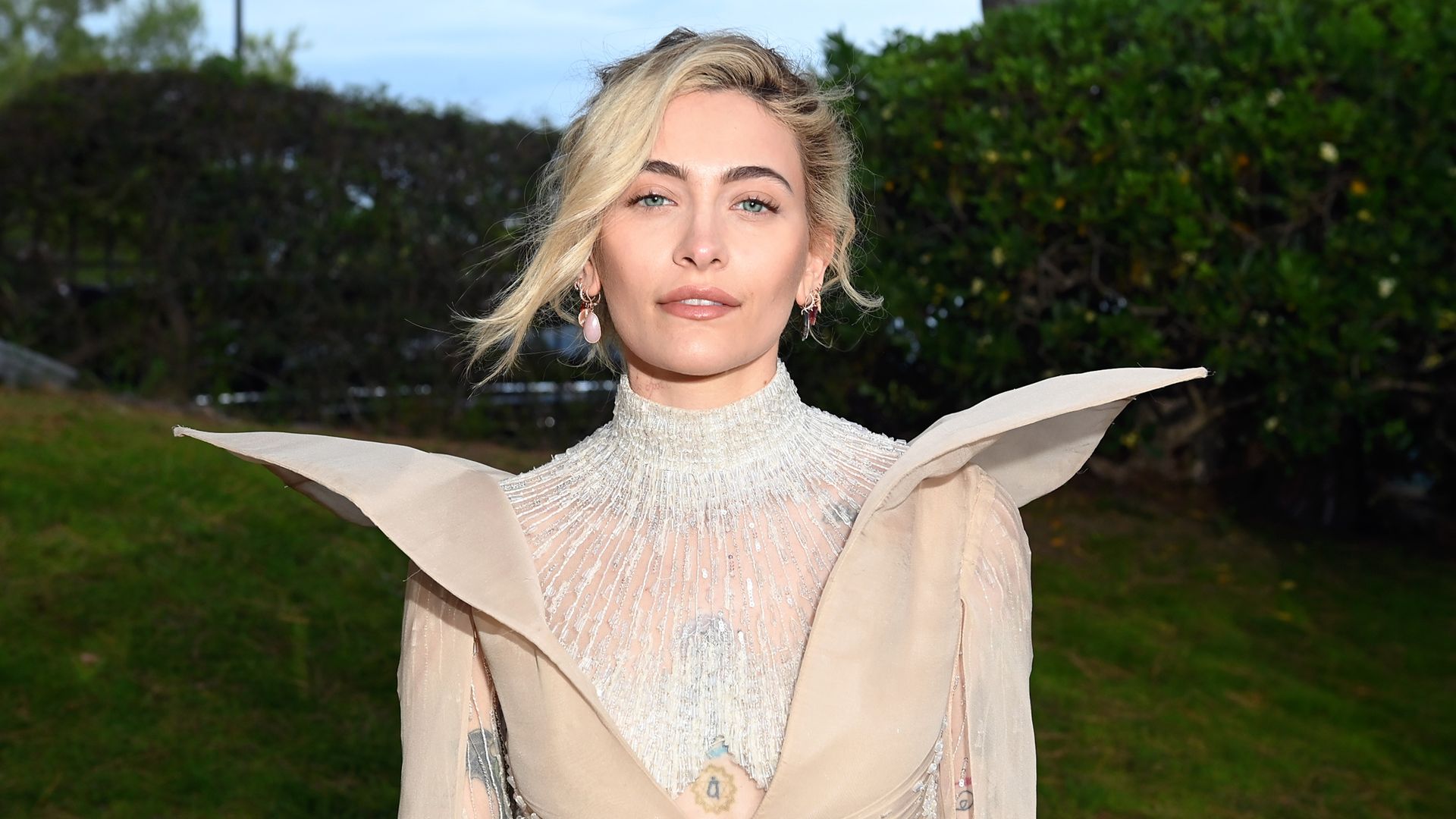 Paris Jackson poses in dramatic sheer gown at the amfAR Gala in Cannes