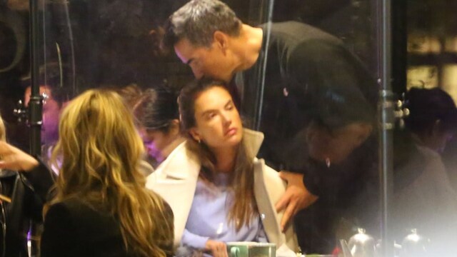 Alessandra Ambrosio enjoys a kiss with Richard Lee during dinner date
