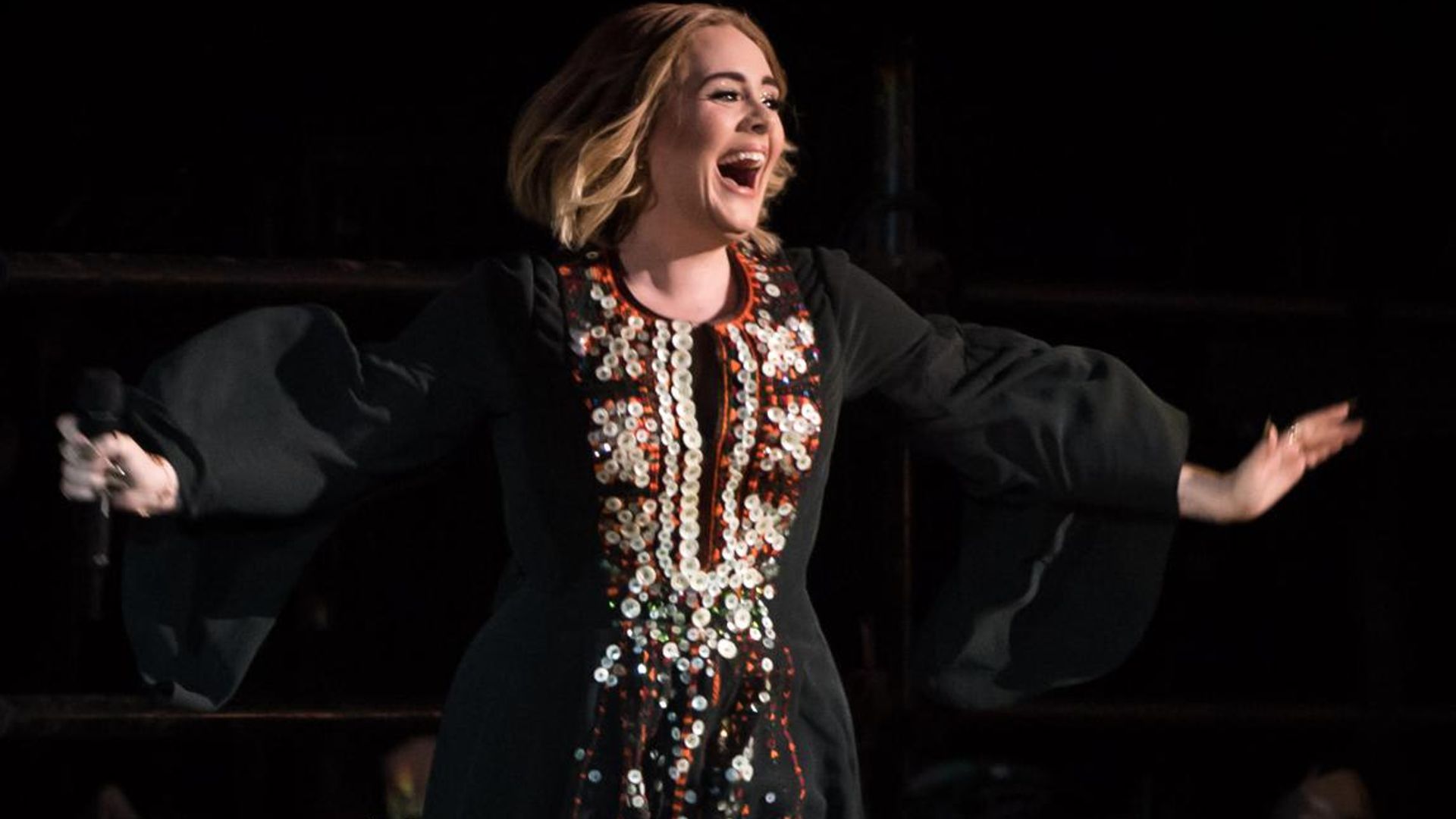 Adele shows off weight loss by wearing 2016 performance dress