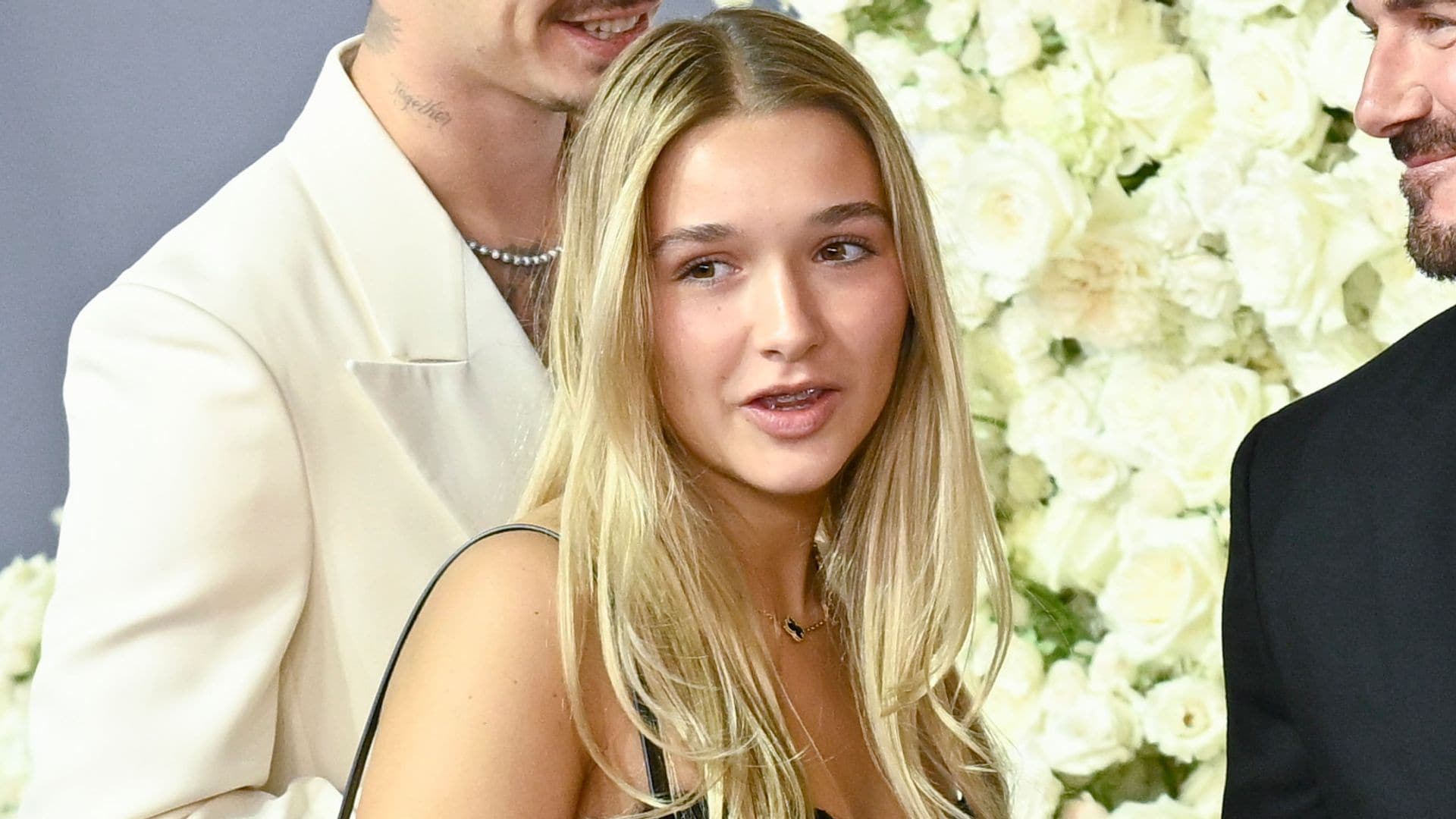 Harper Beckham steps out in satin and feathers at Holly Ramsay’s winter wedding