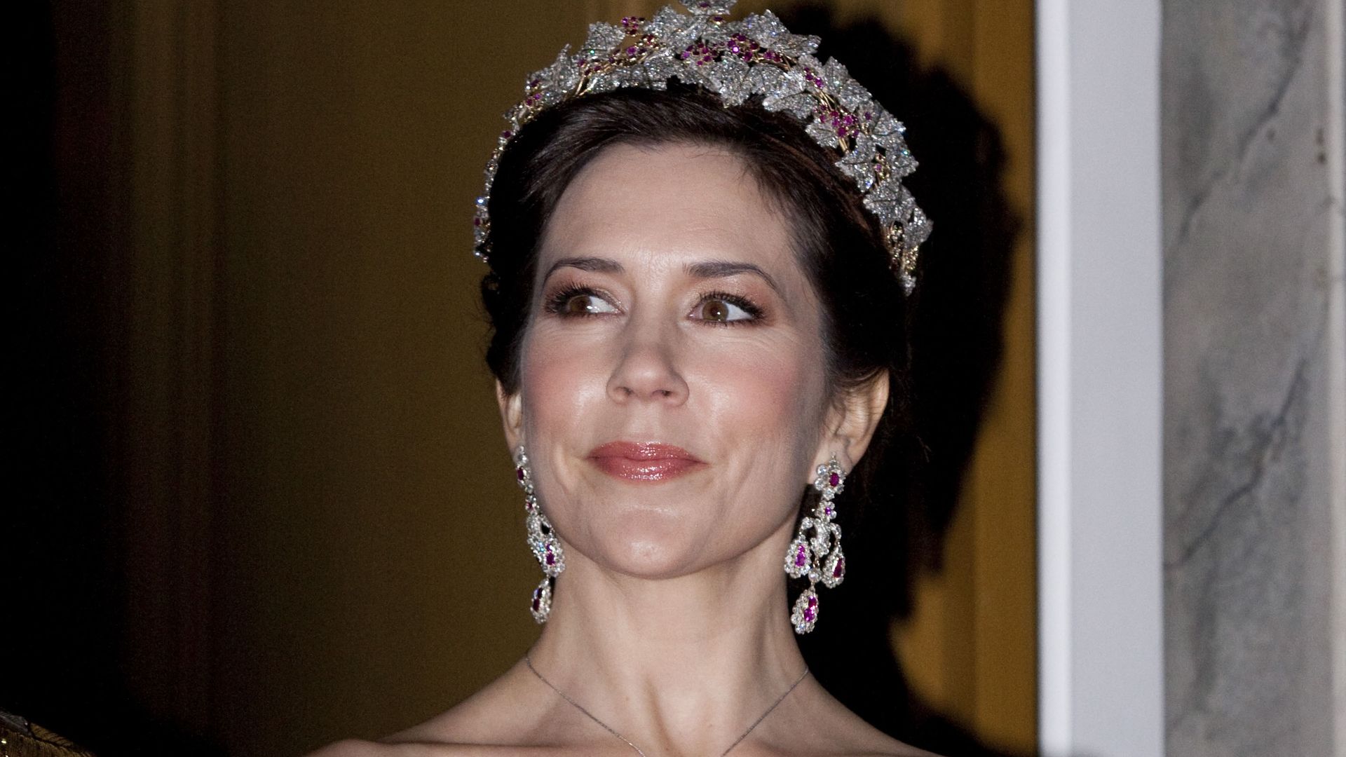Our expert analyzes Queen Mary of Denmark’s gala style at 54 — and compares her to Queen Sofía