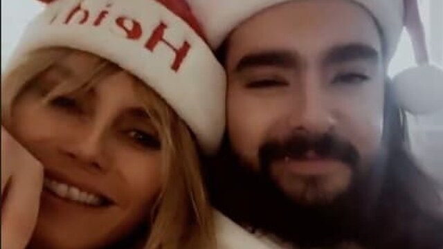 Heidi Klum is getting her Christmas cuddling done early