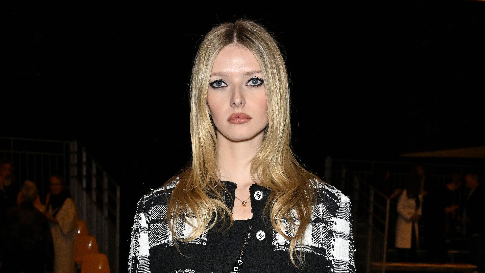 Apple Martin channels mom Gwyneth Paltrow in a candy stripe bikini