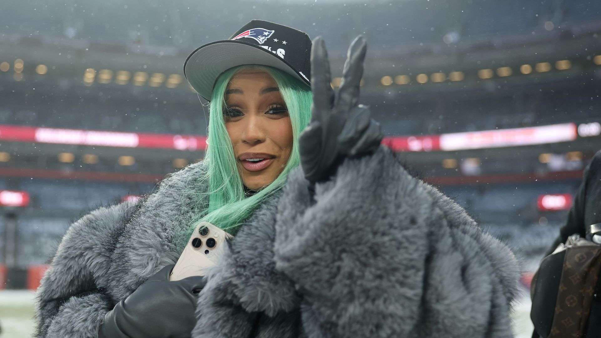 Artist Cardi B poses for a photo following the AFC Championship Playoff game against the Denver Broncos at Empower Field At Mile High on January 25, 2026 in Denver, Colorado. The New England Patriots defeat the Denver Broncos 10-7. (Photo by Matthew Stockman/Getty Images)