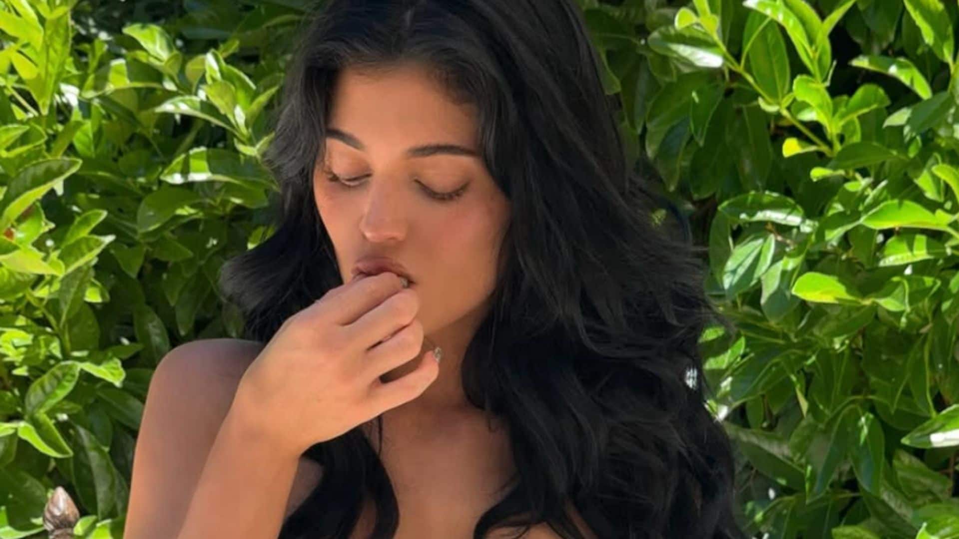 Kylie Jenner seductively eats cherries in tiny leopard bikini during Italian getaway