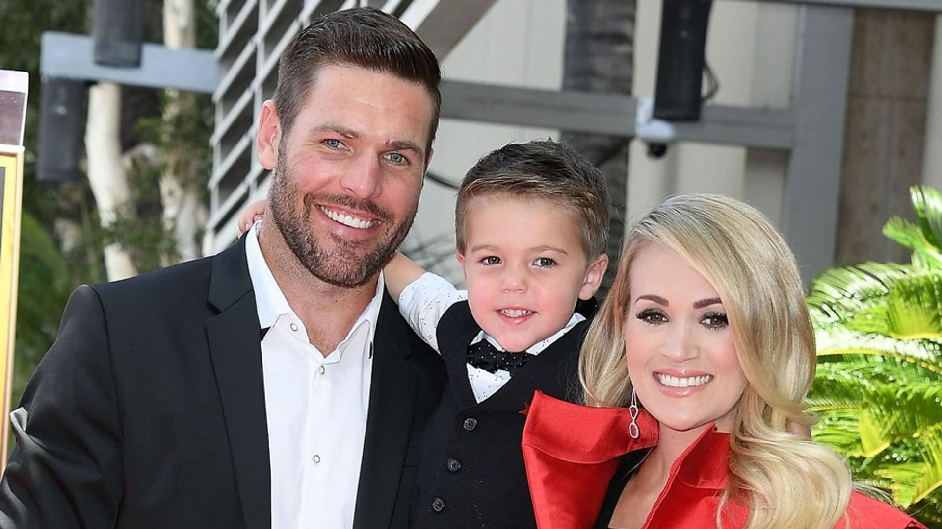 Carrie Underwood's baby giggles when Carrie sings, cries when Dad sings!