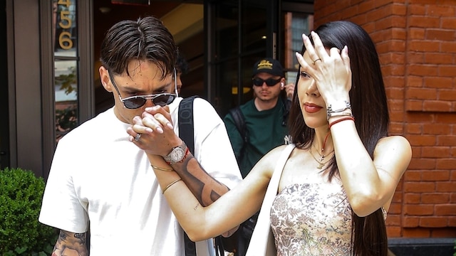 Mexican singer and rapper Peso Pluma and his girlfriend Kenia Os are seen holding hands and kissing in New York.