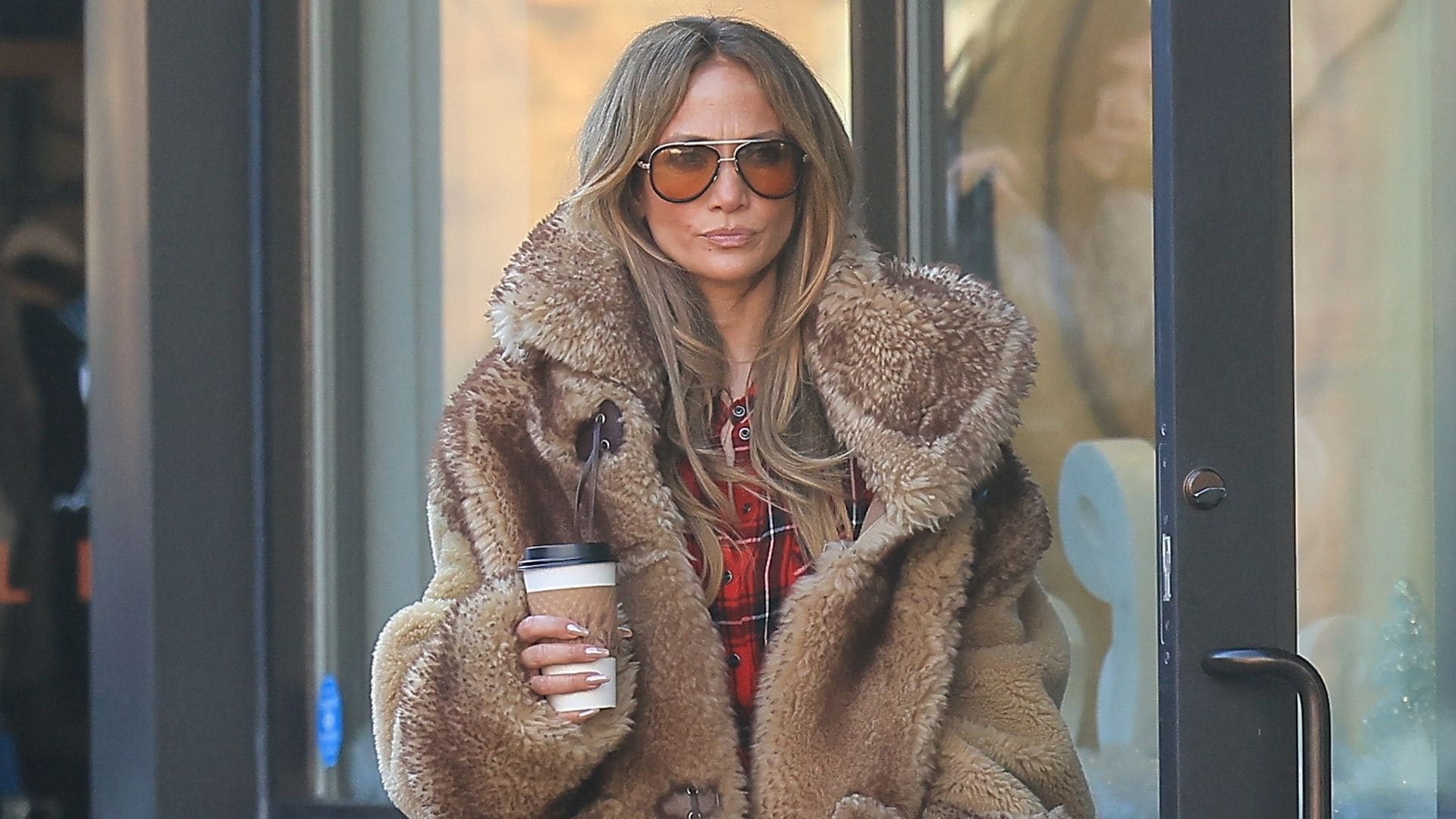 Jennifer Lopez masters the après-ski look in designer winter wear and her engagement ring