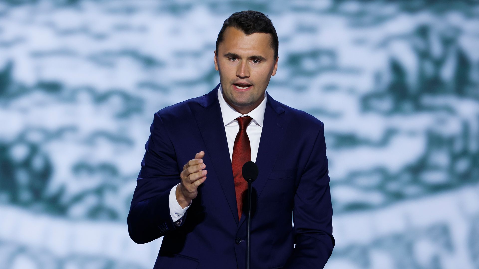 Charlie Kirk, founder of TPUSA, was shot and killed at a Utah event. Political leaders, including Trump, Biden, and Harris, reacted to the tragedy.