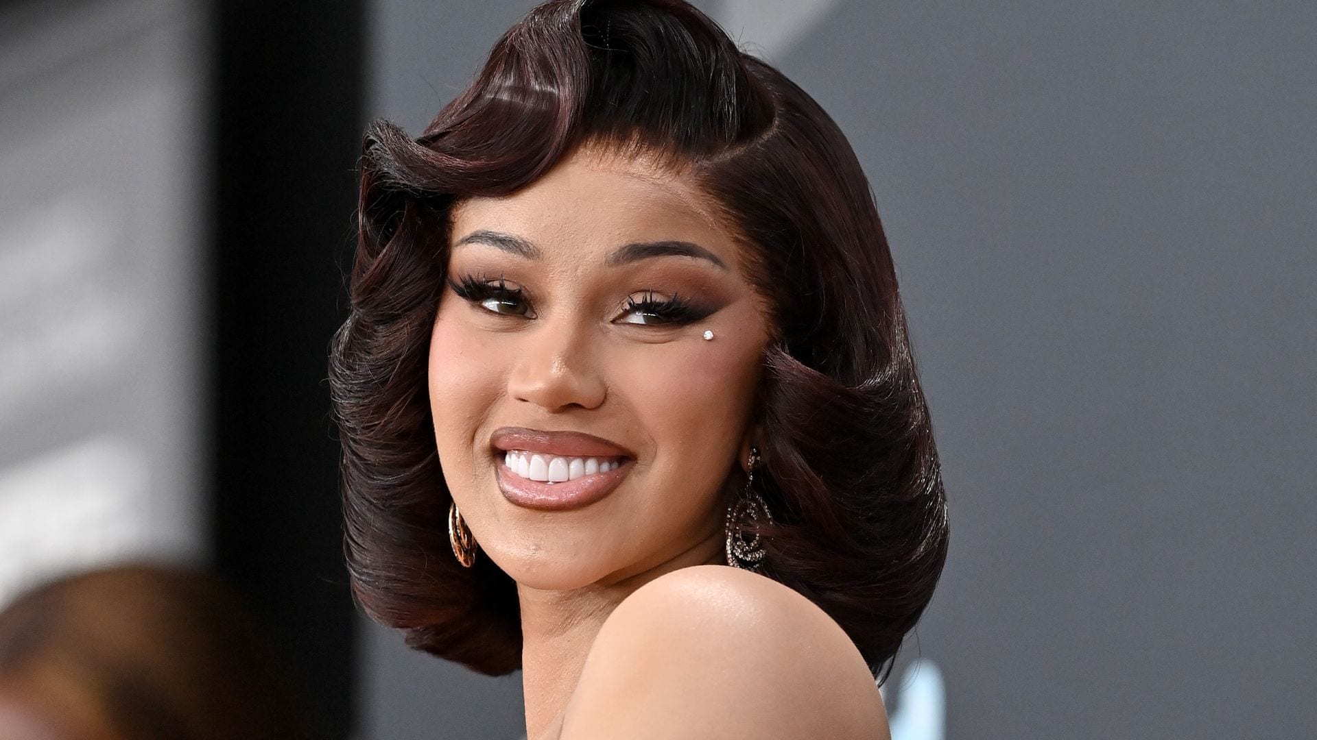 Cardi B shares first adorable photo of her baby while cheering on boyfriend Stefon Diggs