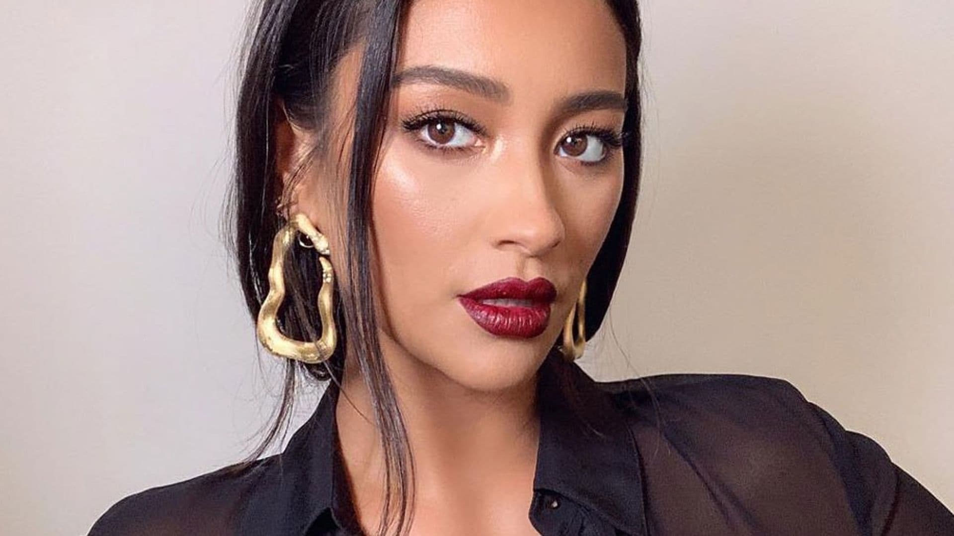 Shay Mitchell announces her pregnancy with a radiant glow and summer top knot 