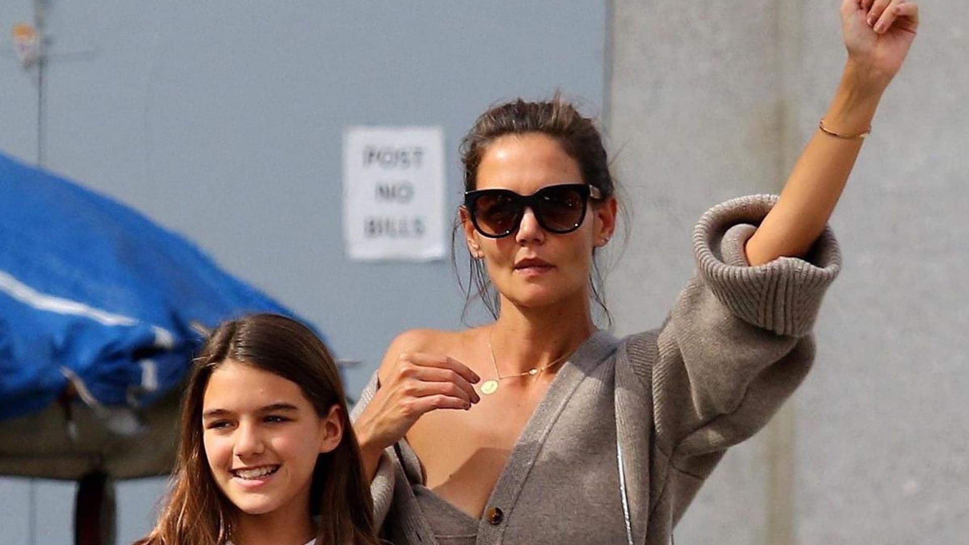 Flashback Friday: Katie Holmes hails a cab in a cashmere bra with Suri Cruise