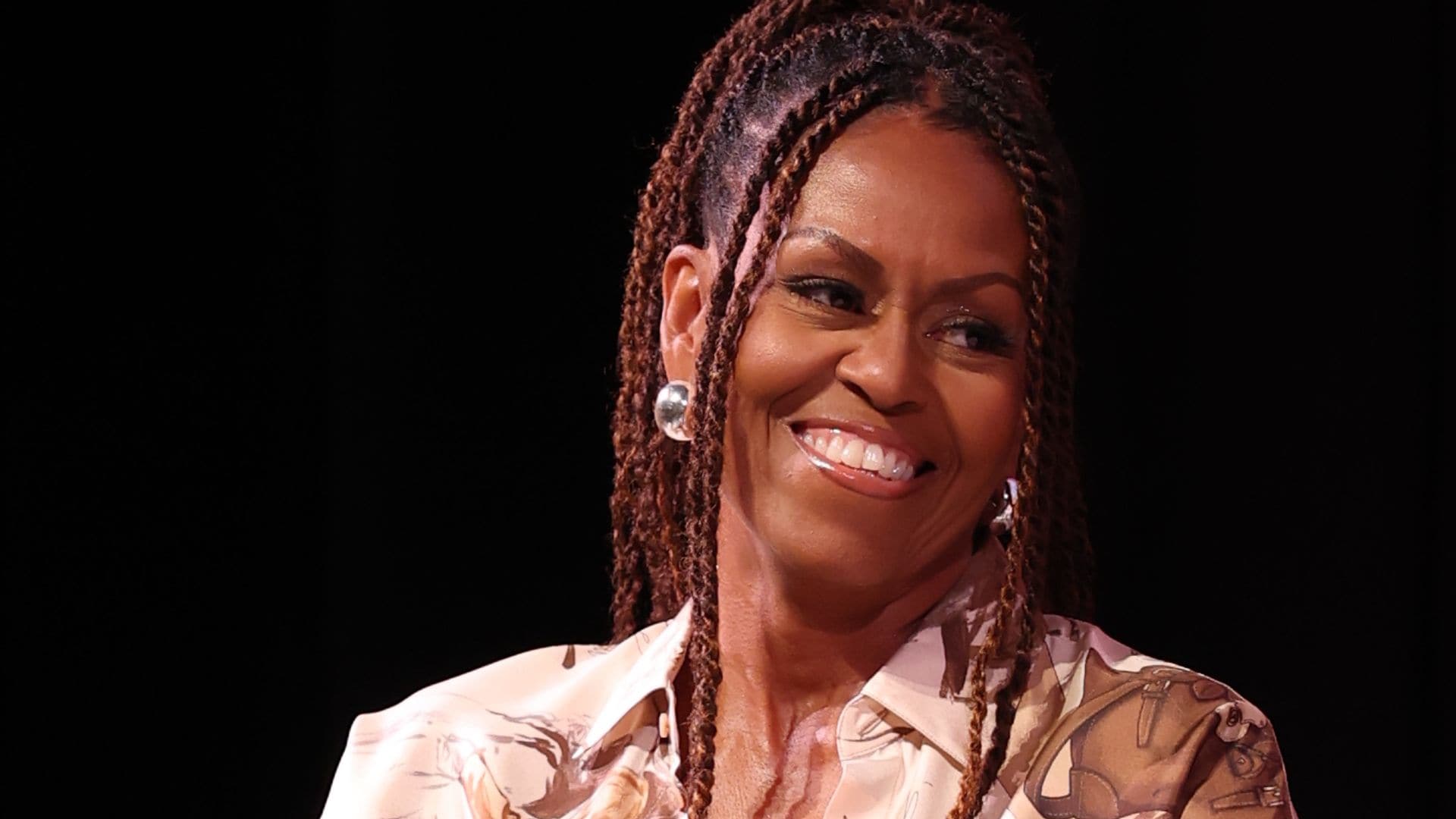 Michelle Obama’s latest semi-sheer look and gold jewelry: inside her hair and makeup evolution