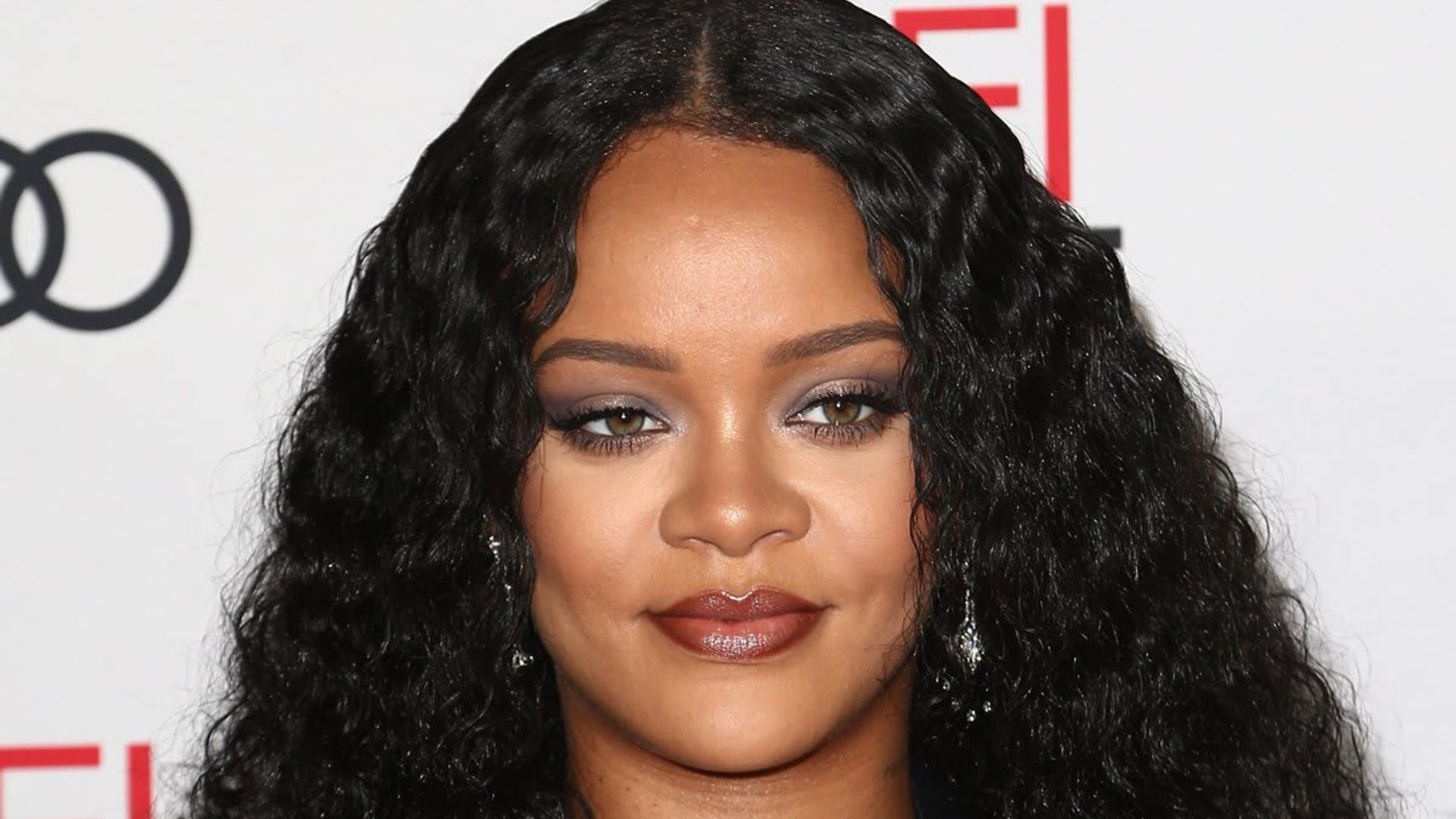 Rihanna turned heads in a pink slip dress and a matching fur pink bucket hat for date night