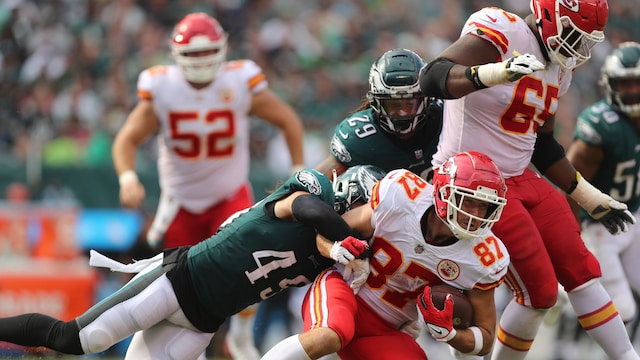 PHILADELPHIA, PA - OCTOBER 3: Travis Kelce #87 of the Kansas City Chiefs is tackled by Alex Singleton #49 of the Philadelphia Eagles during an NFL football game against the Philadelphia Eagles at Lincoln Financial Field on October 3, 2021 in Philadelphia, Pennsylvania. (Photo by Perry Knotts/Getty Images) 